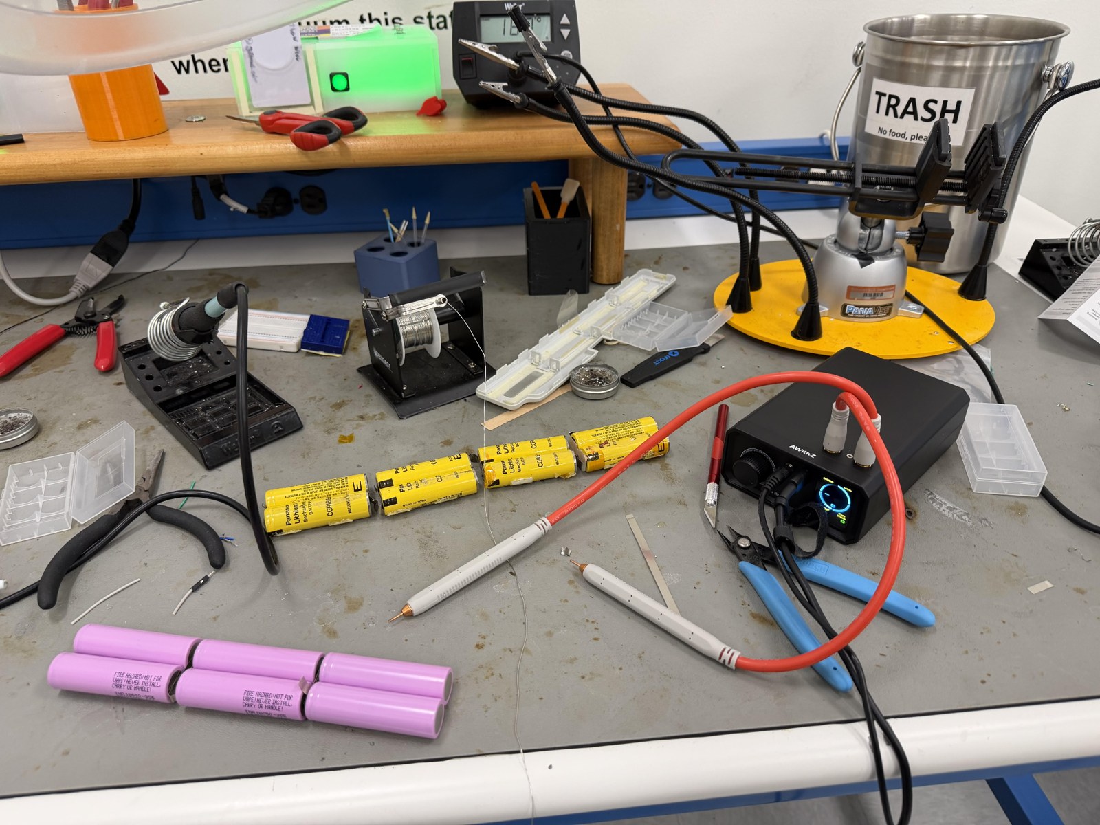 Battery cells and spot welding equipment on the workbench